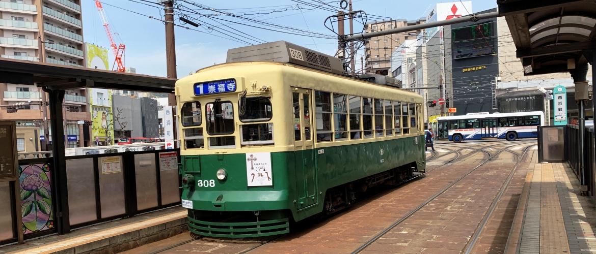 cheap Japan travel by public transit - buses and trams are cheap